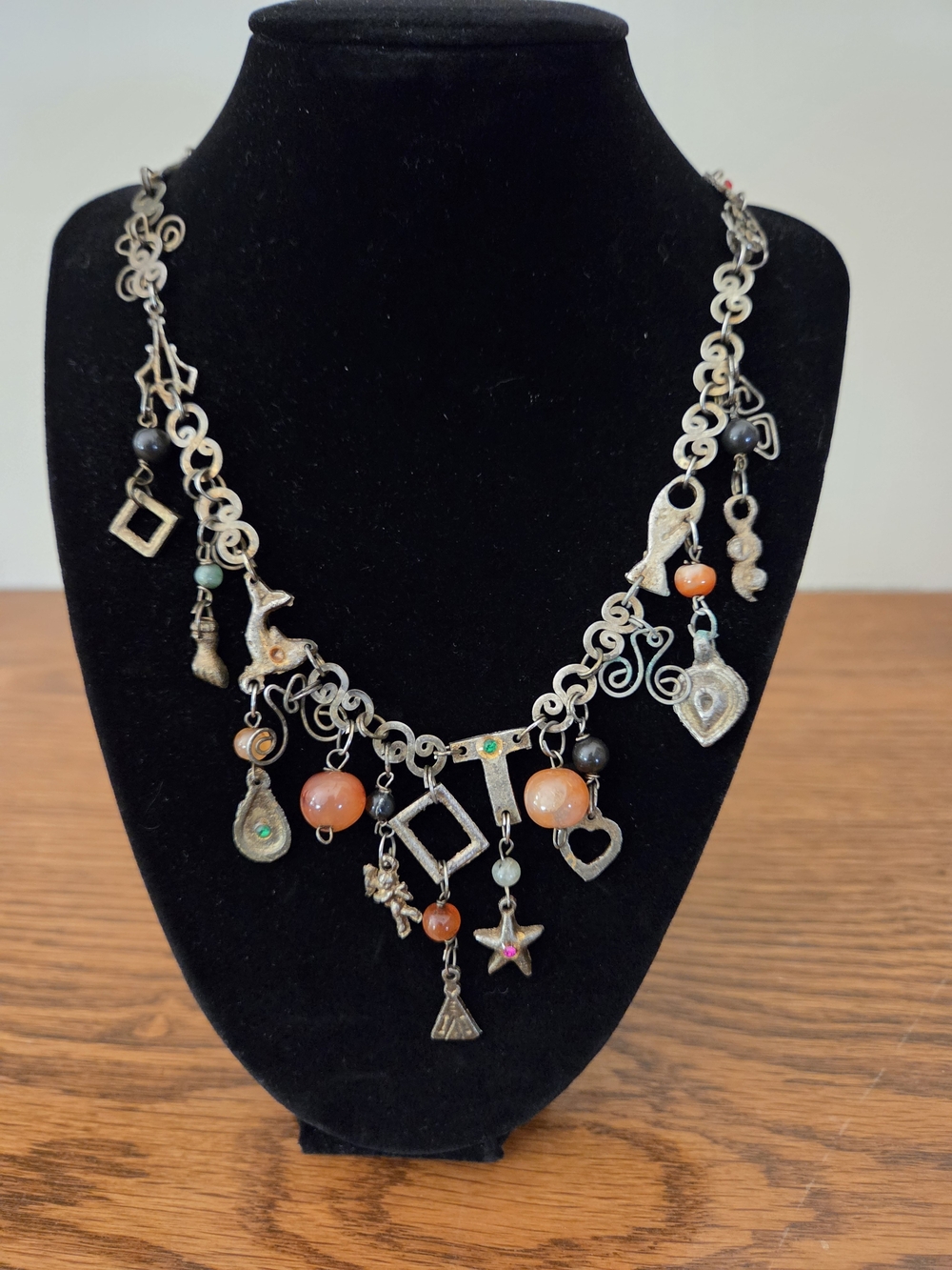 Boho Charm Necklace with Orange Beads and Mixed Metal Charms